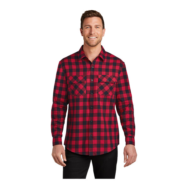 A man wearing a red and black Port Authority Buffalo check flannel shirt.