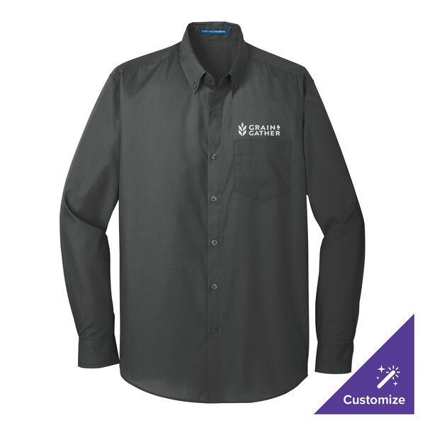 A small graphite long sleeve Port Authority dress shirt with a logo on the chest.