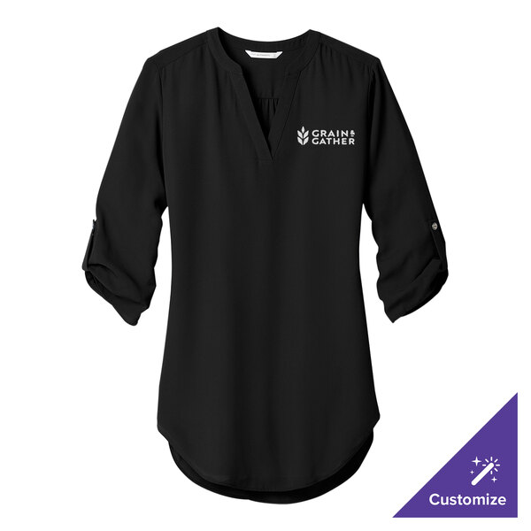 A black Port Authority tunic blouse with white custom text on the front.
