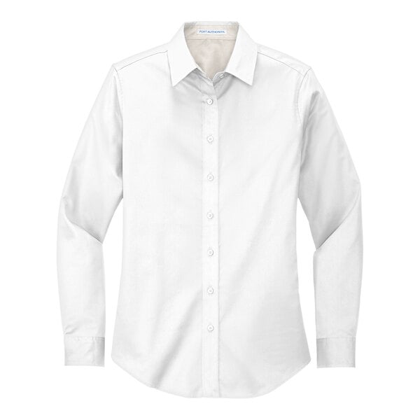 A Port Authority white long sleeved poplin dress shirt for women.
