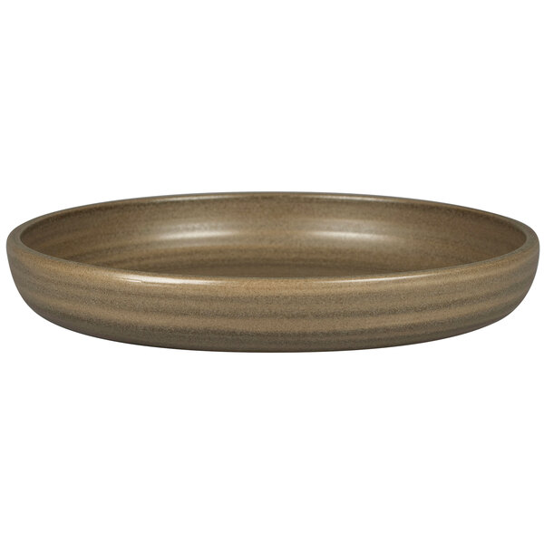 A dark brown Rak Porcelain deep coupe plate.