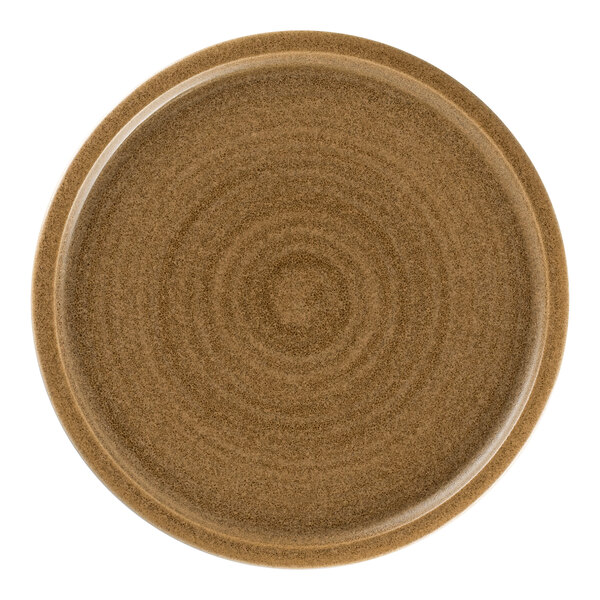 A brown Rak Porcelain flat coupe plate with a spiral pattern.