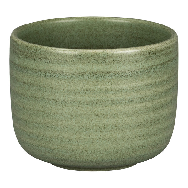 A close up of a dark green Rak Porcelain bowl with a stripe pattern.