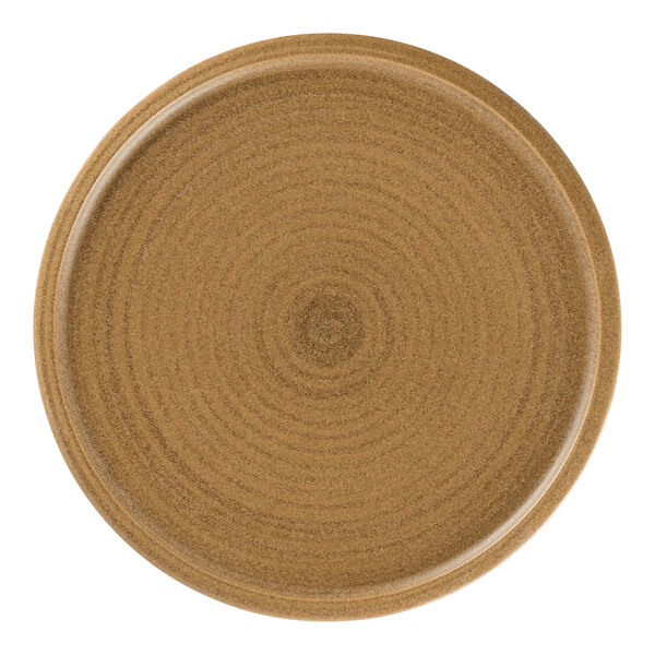 A Rak Porcelain brown porcelain plate with a circular pattern.