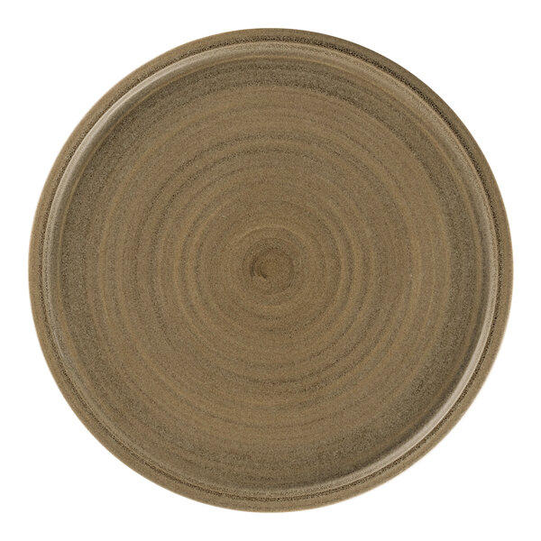 A brown Rak Porcelain flat coupe plate with a circular pattern.