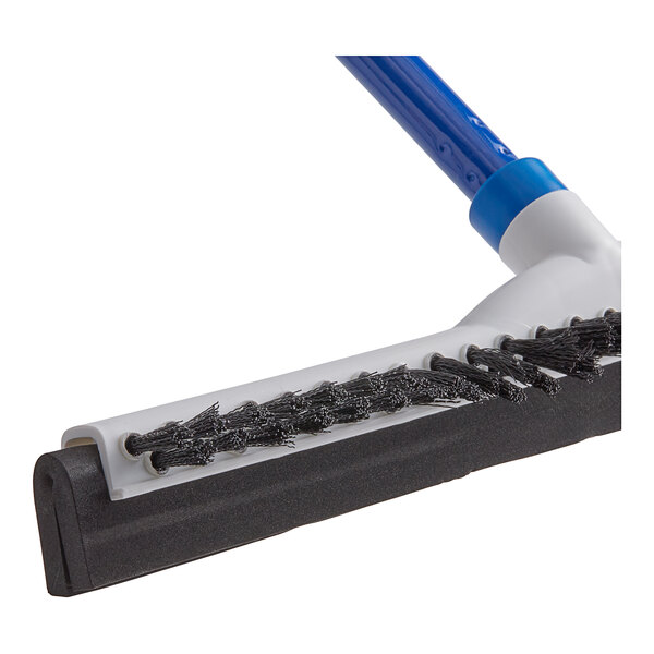 An Ettore floor squeegee with a brush on the handle.