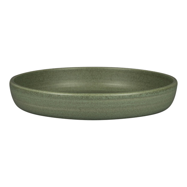 A dark green Rak Porcelain deep coupe plate with a rim.