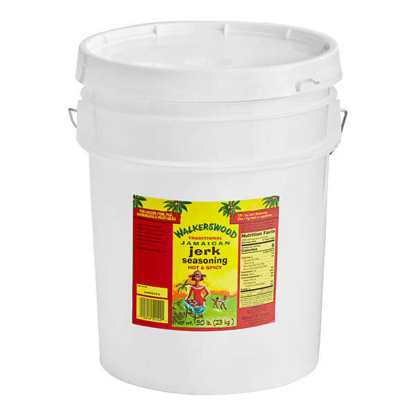 A white Walkerswood bucket of Hot and Spicy Jerk Seasoning with a label.