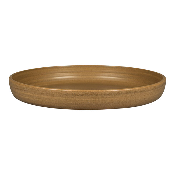 A brown porcelain deep coupe plate with a brown rim.