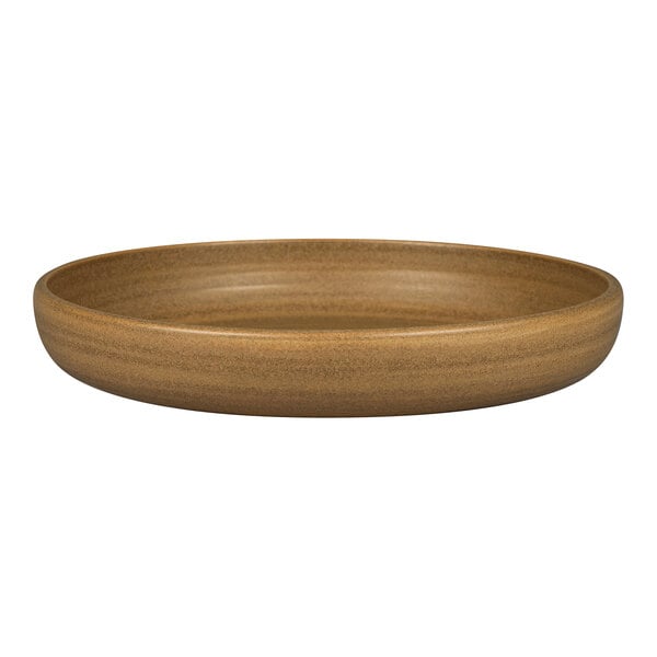 A Rak Porcelain brown porcelain deep coupe plate on a table.