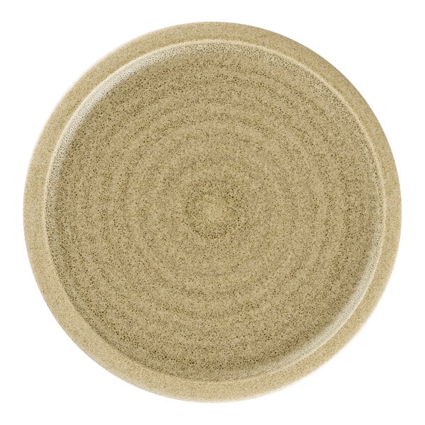 A close up of a beige Rak Porcelain flat coupe plate with a circular pattern.