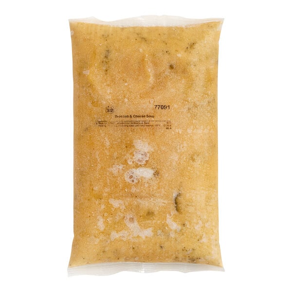 A plastic bag of Blount Fine Foods Broccoli and Cheddar Cheese Soup on a white background.