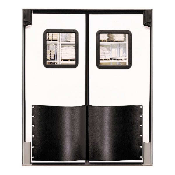 A pair of white Chase double swinging traffic doors with black trim and windows.