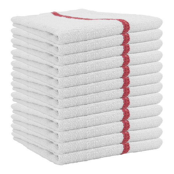 A stack of white Monarch Brands bar towels with red stripes.