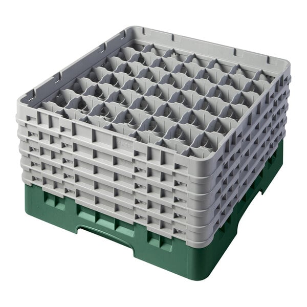 A large green plastic Cambro glass rack with several extenders inside.