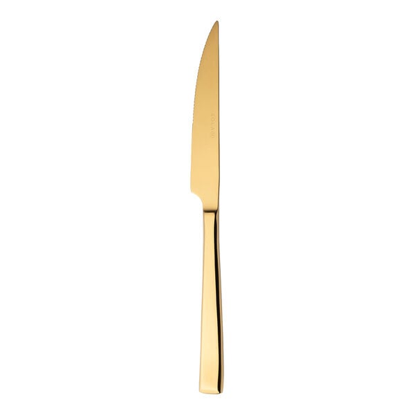 A Sola stainless steel steak knife with a gold handle.