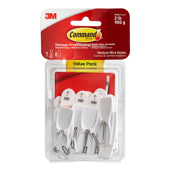 A pack of 7 white 3M Command wire hooks.