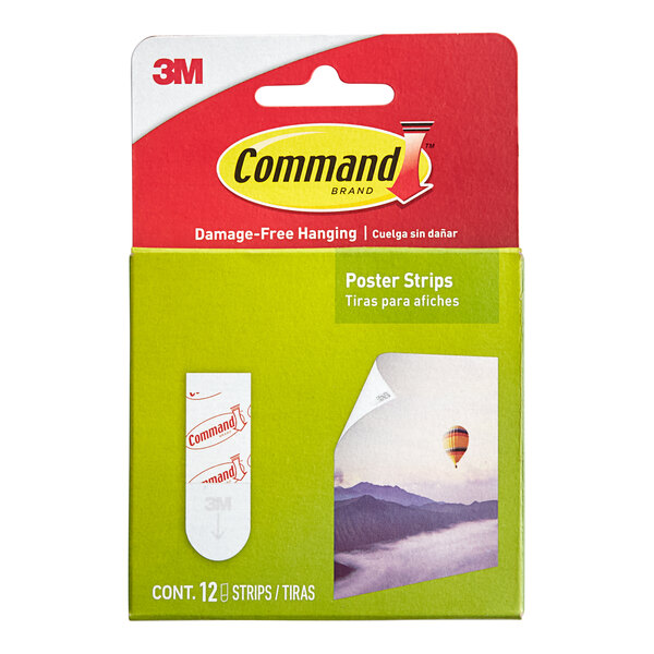 A green and white box of 3M Command poster strips.