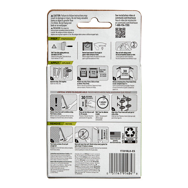 A package of 4 black 3M Command medium picture hanging strip pairs with instructions on the box.