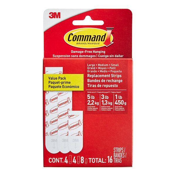 A red box of 3M Command assorted foam adhesive strips with white and red strips.