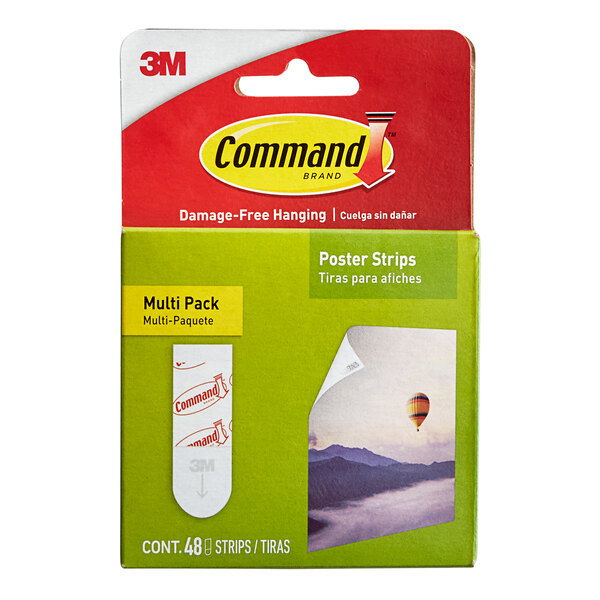 A green and white box of 3M Command poster strips.