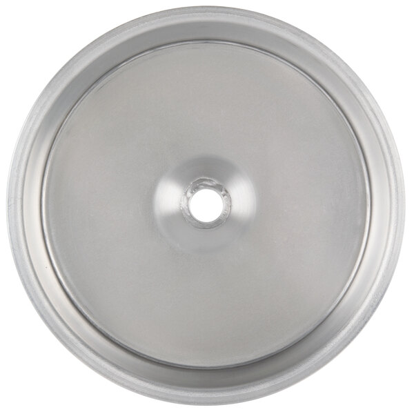 A stainless steel circular pan with a hole in the center.