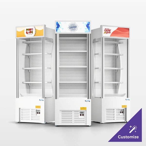 A set of three white refrigerated air curtain merchandisers with customizable signage at the top.