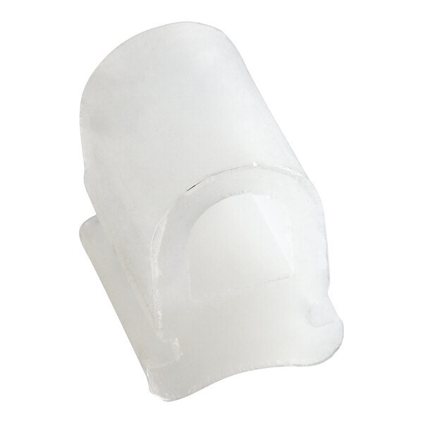 A white rubber tube holder with a small hole in it.