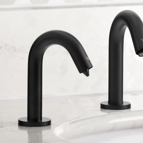A Waterloo matte black automatic soap dispenser on a white counter.