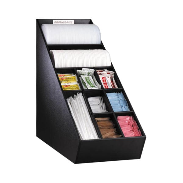 A black Dispense-Rite countertop organizer with various colored condiments inside.