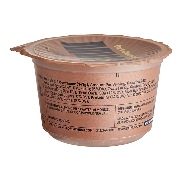 A close up of a container of Oats Overnight Chocolate Dark.