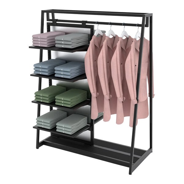 An Econoco glossy black double-sided retail clothing rack with shelves, hangrail, and frosted panels holding folded white and green sheets.