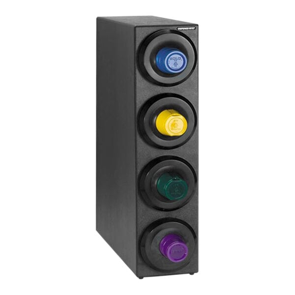 A black Dispense-Rite countertop cup dispenser with four black and yellow caps.
