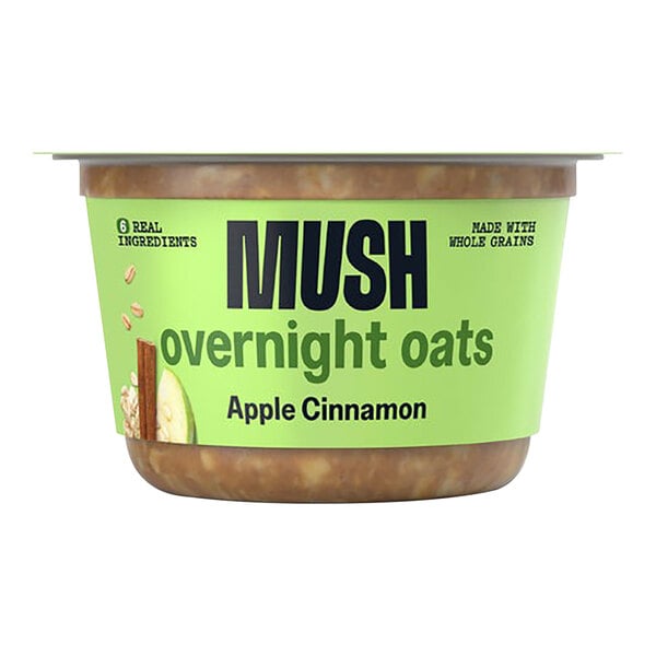 A case of MUSH Apple Cinnamon Overnight Oats with green and yellow packaging.