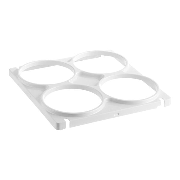 A white plastic top cover with four circular holes.