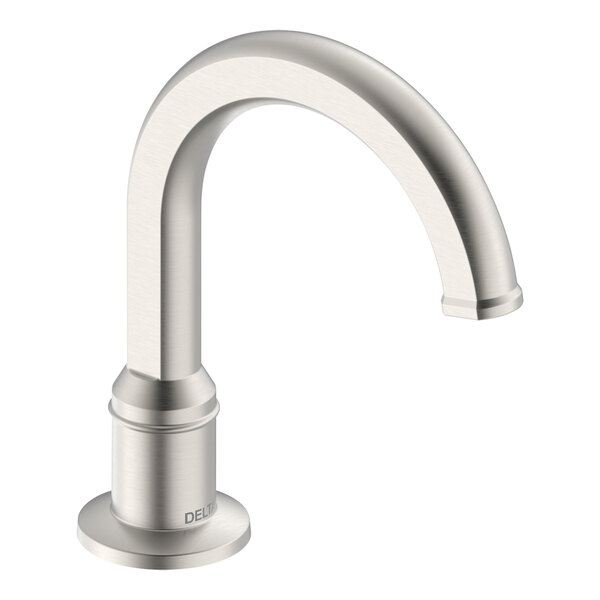 A silver Delta hands-free faucet with a round base.