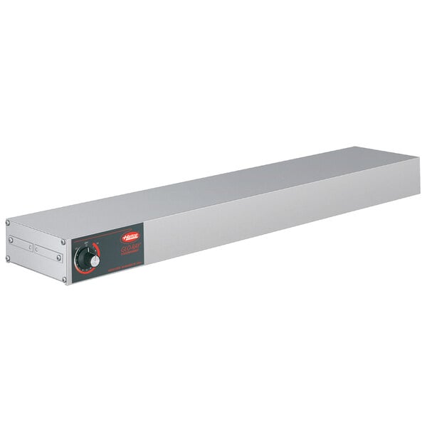 A rectangular stainless steel Hatco food warmer with a red label and dial.