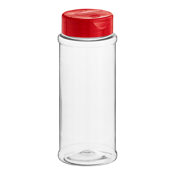 A clear plastic bottle with a red lid containing spice.