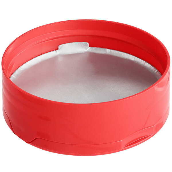 A red round plastic spice container with a silver induction-lined dual flapper lid.