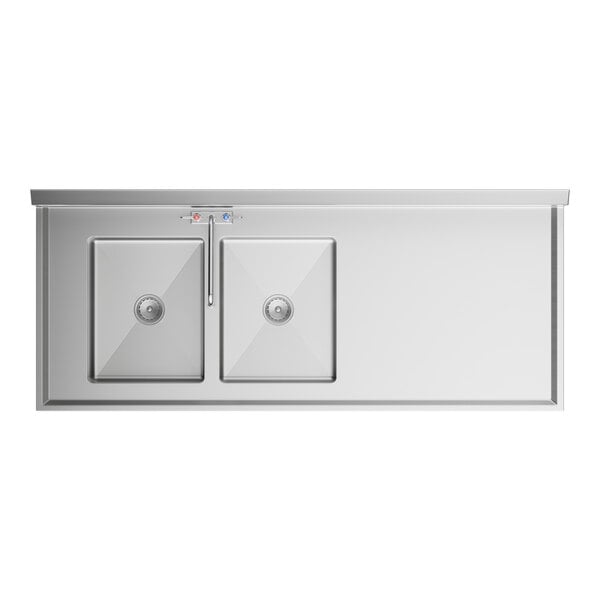 A Regency stainless steel work table with two sinks on the left.