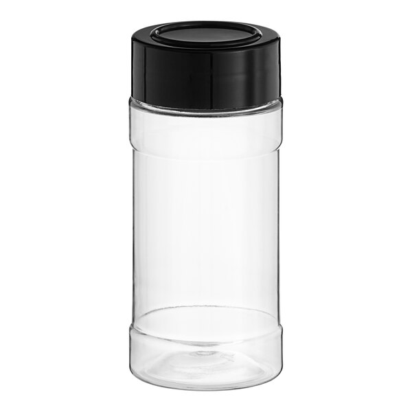 A clear plastic spice container with a black lid.