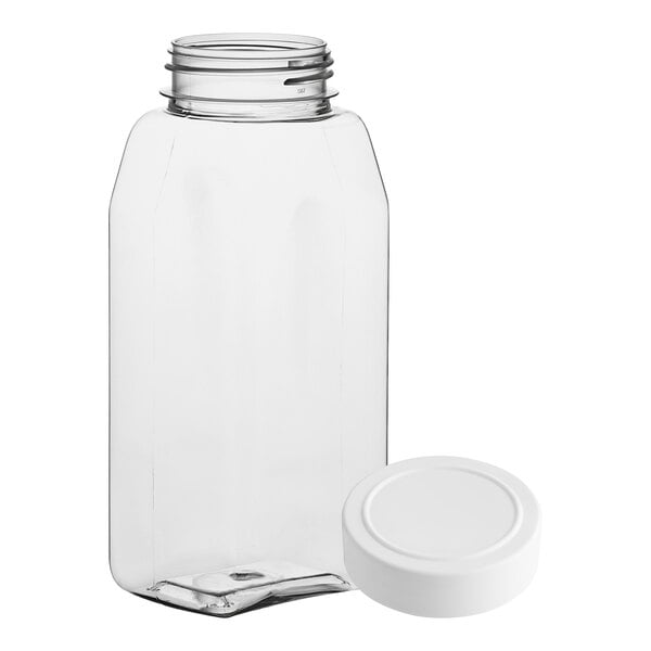 A clear plastic rectangular spice container with a white lid.