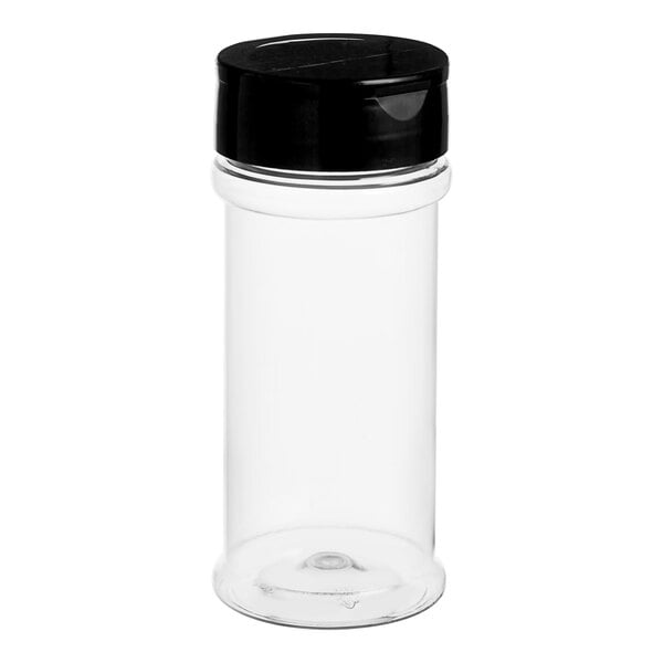 A clear plastic round spice container with a black dual flapper lid.