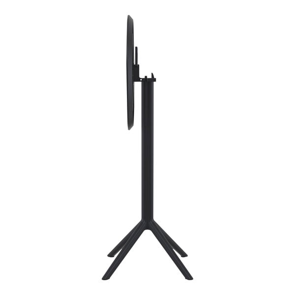 A black pole with a round table top on it.
