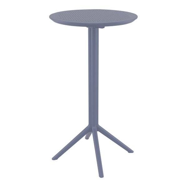 A Siesta Sky round dark gray table with a metal base.