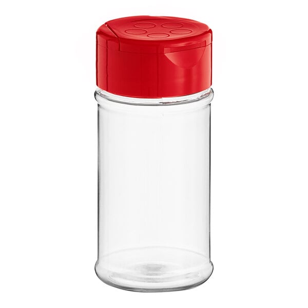 A clear plastic container with a red lid.