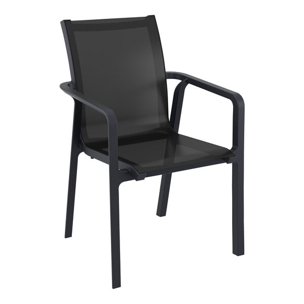 A Siesta Pacific black resin outdoor arm chair with black sling and armrests.