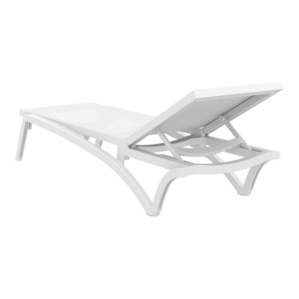 A Siesta Pacific white resin chaise lounge with white sling fabric.
