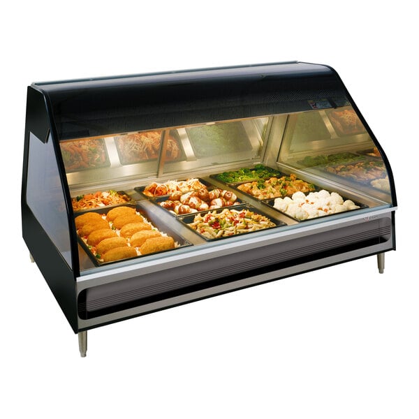 An Alto-Shaam black countertop heated display case with food inside.