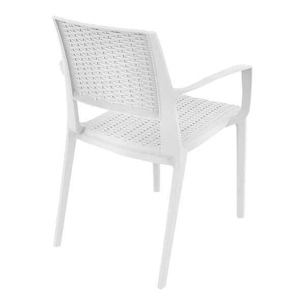 A Siesta Capri white plastic outdoor dining arm chair with a woven seat.